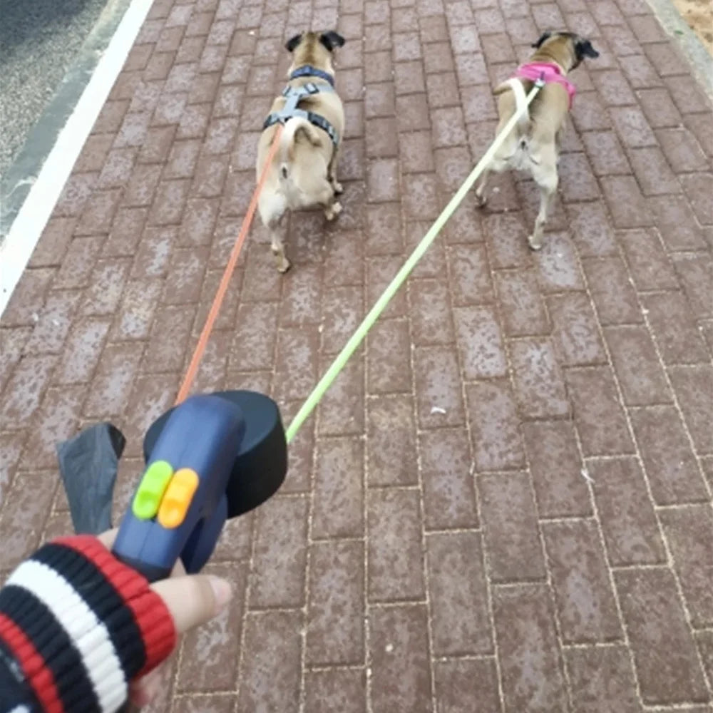 (2) Two Dog Reflective Retractable Pet Leash Ropes – 360 Degree Zero Tangle - Two Dogs Each up to 50 Lbs, Reflective Orange and Green Leads, Dual Locking, Auto Retractable with Flashlight